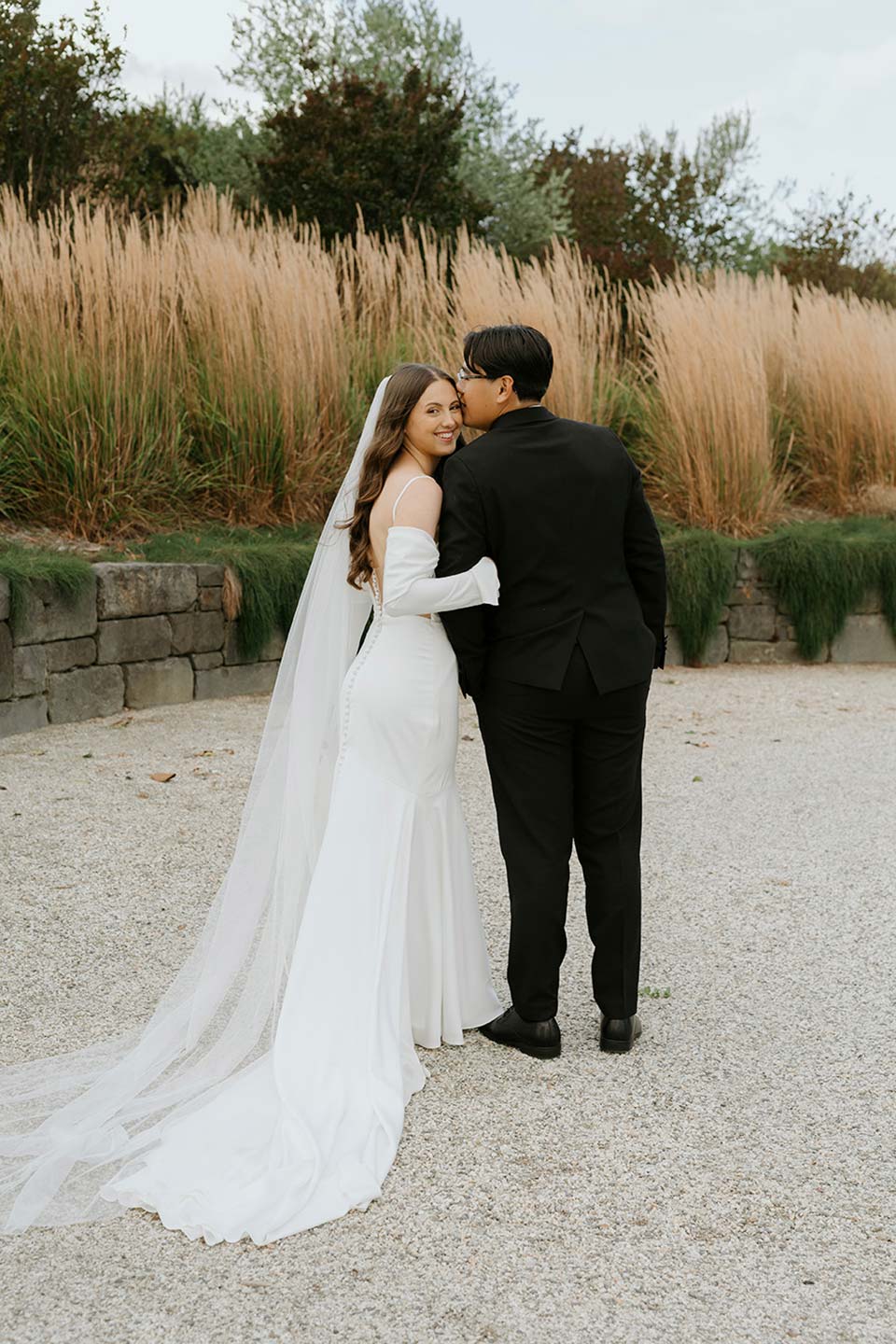 Zonzo Weddings Couple Outside Capella